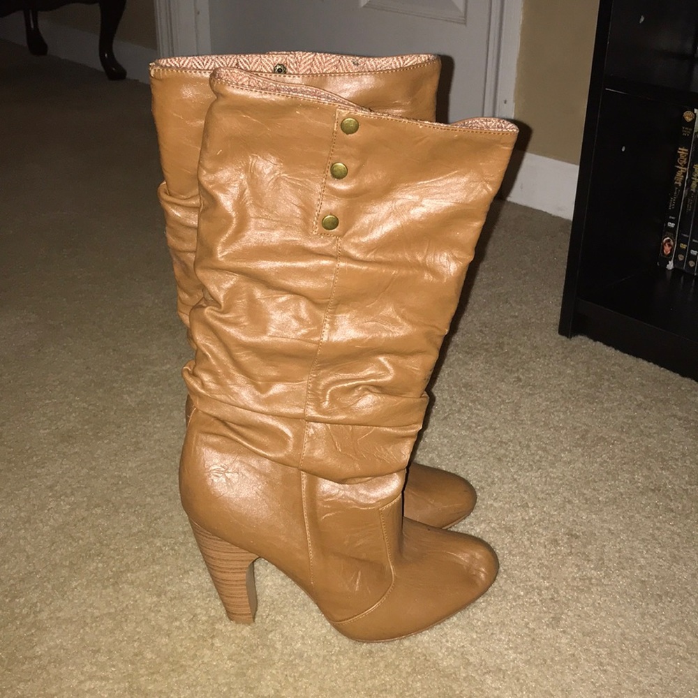 Tan high heeled boots
